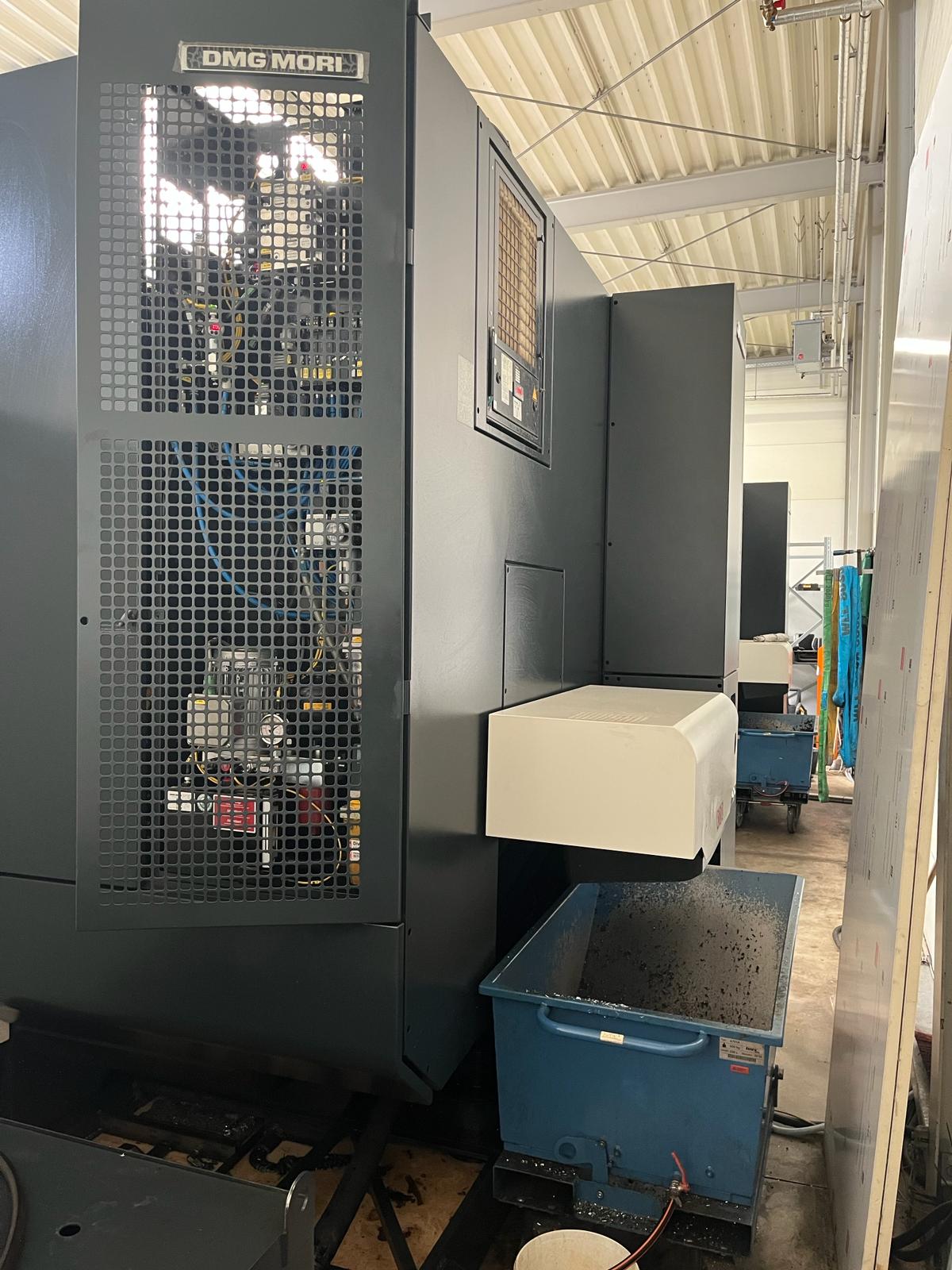 CENTRO DI LAVORO VERTICALE A 5 ASSI DMG - DMC 65 MonoBlock